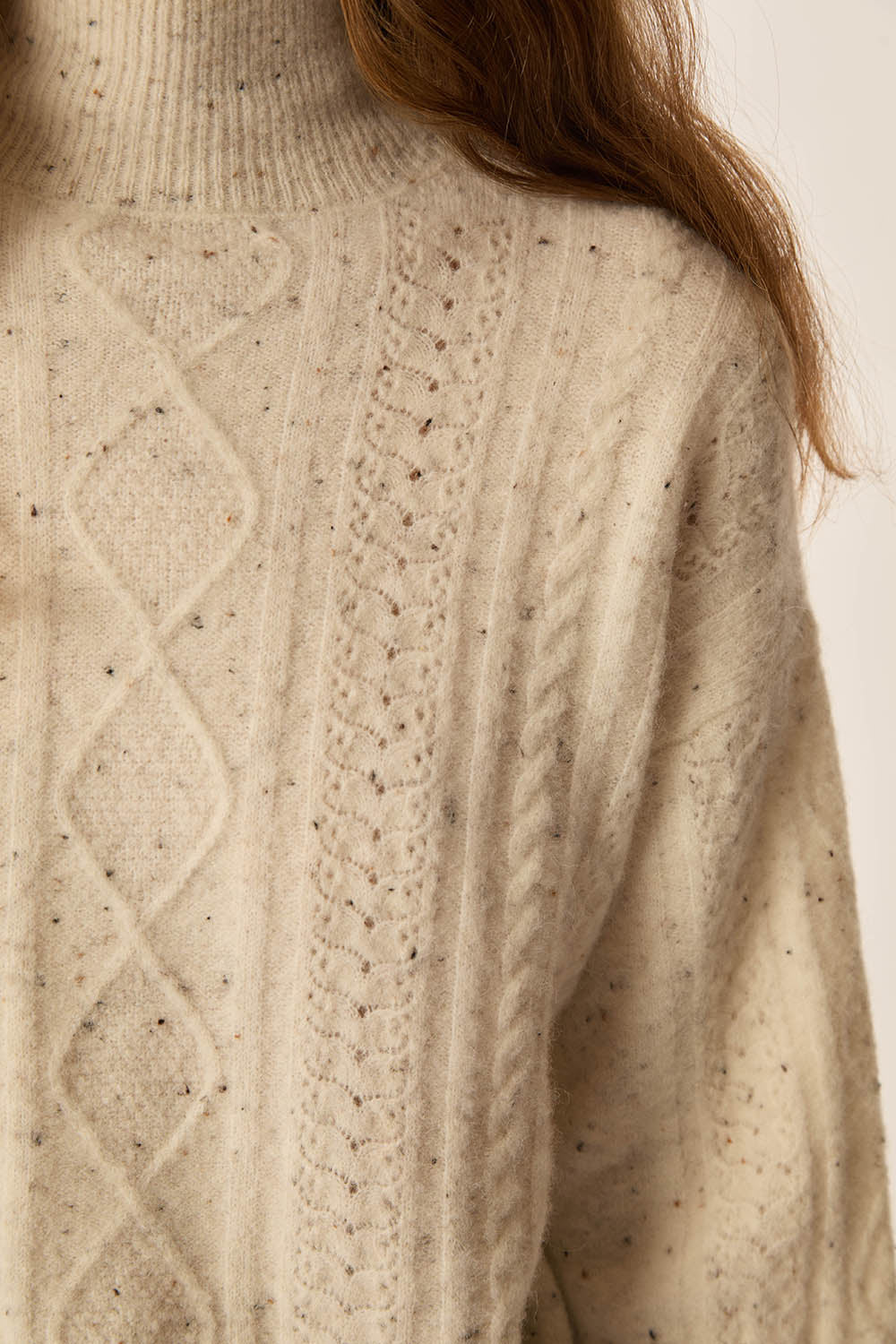 Pull Dino Creme Tweed