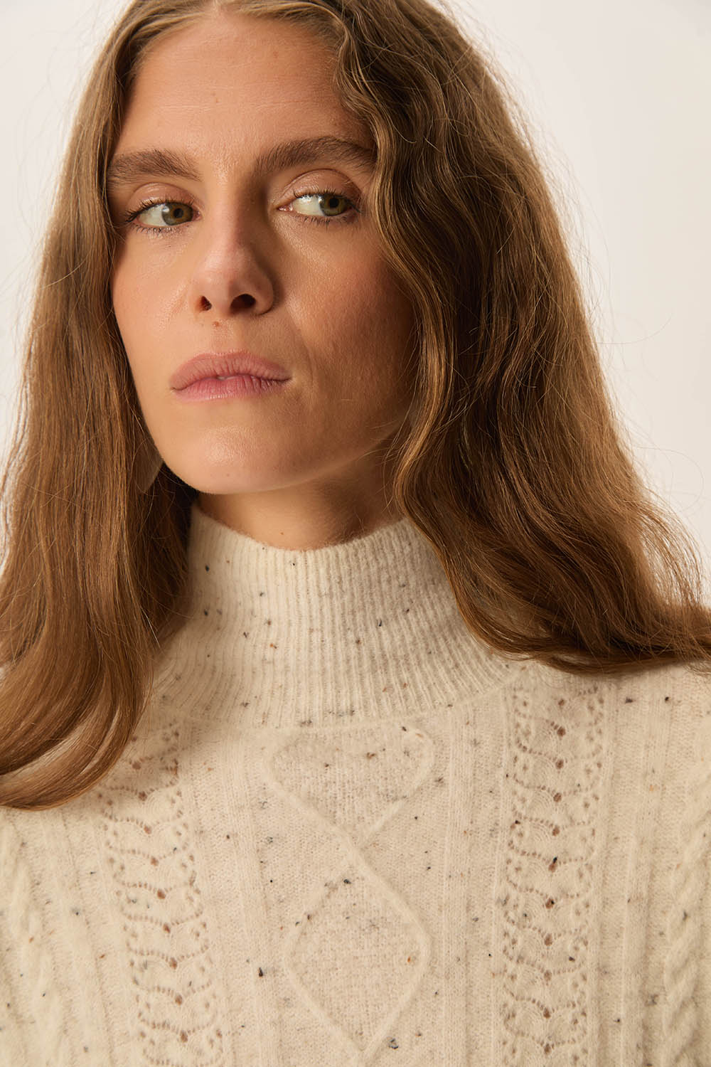 Pull Dino Creme Tweed