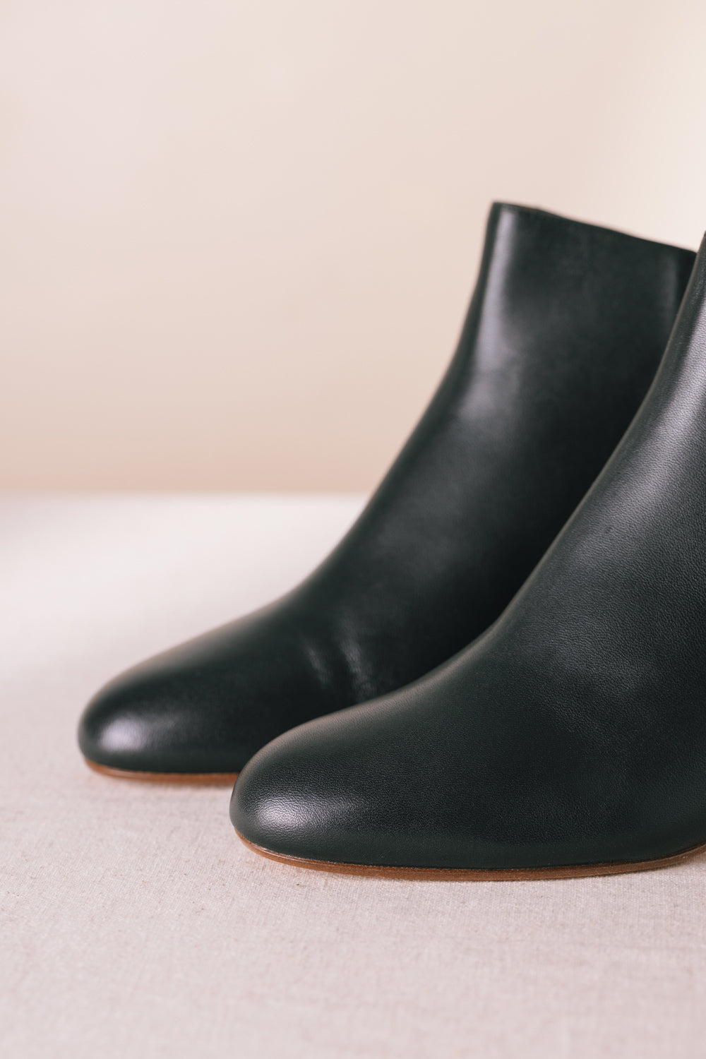 black leonard heeled ankle boots